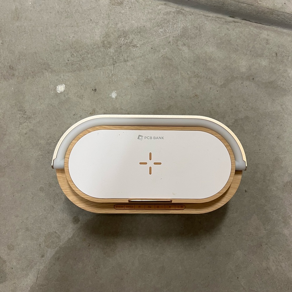 Wireless charger speaker with lamp